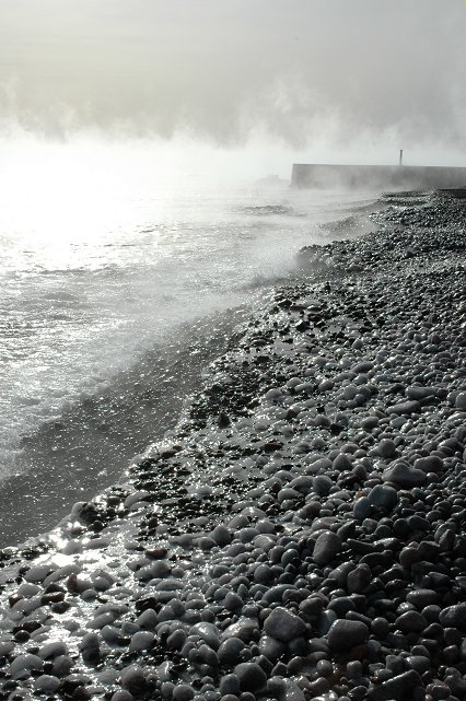Frozen rocks and mist on Lake Superior from Glensheen Manor (temp. 0)