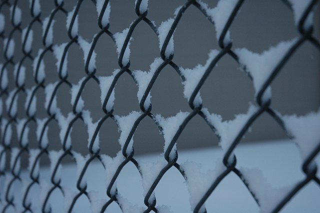 Snow on chain link fence, Duluth, Minnesota
